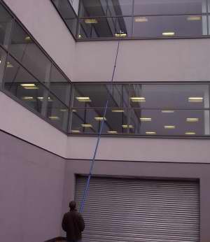Our ladderless window cleaning system in action
